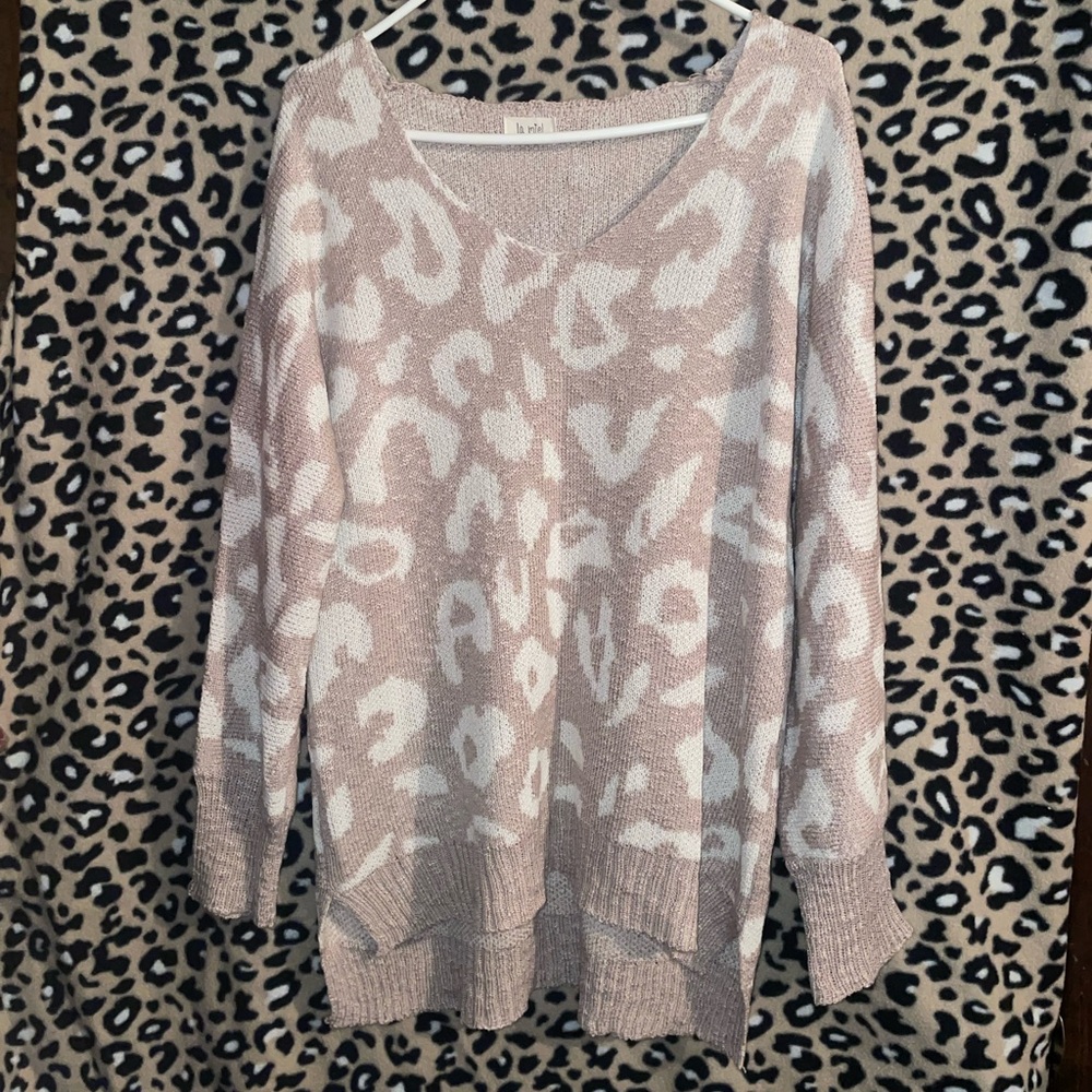 Light pink cheetah print sweater.